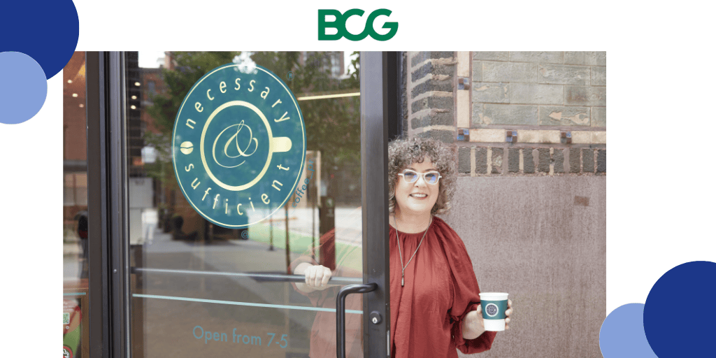 Kate Vrijmoet Holding coffee cup